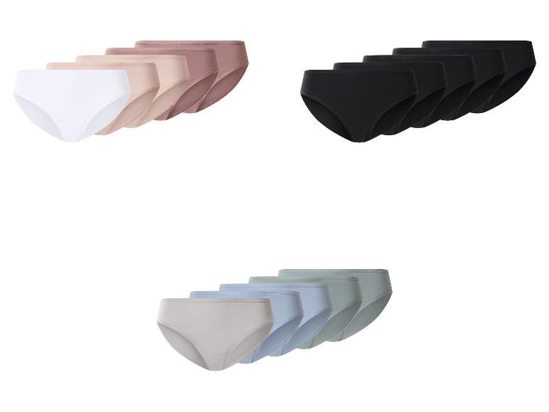 Lot de culottes femme en blanc, noir et diverses couleurs pastel.