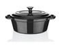 Une cocotte en fonte noire avec un couvercle.