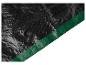 Coin de bâche noire avec bordure verte.