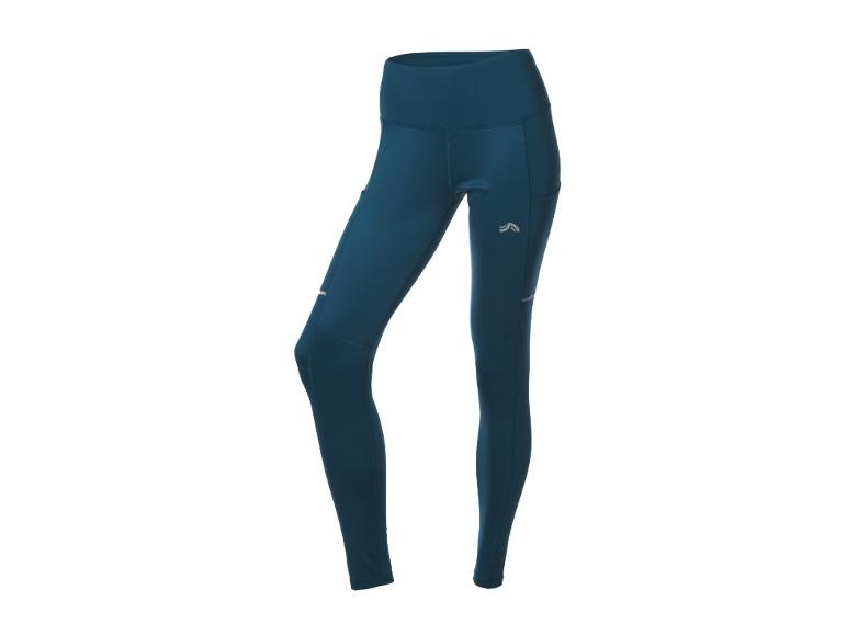 Legging de sport turquoise avec poches latérales et logo réfléchissant.