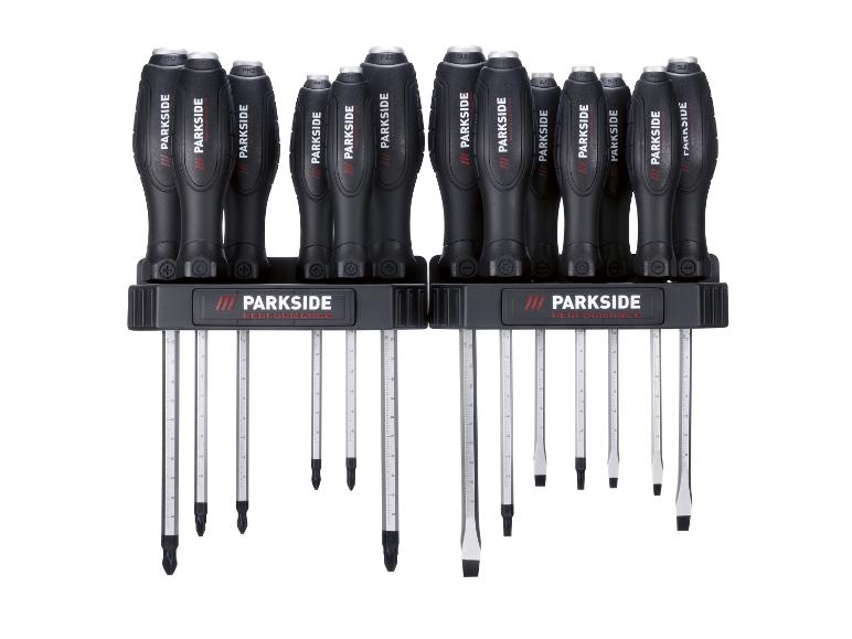 Jeu de tournevis avec embouts Phillips, Pozidriv, Torx et plats variés, dans un support noir.