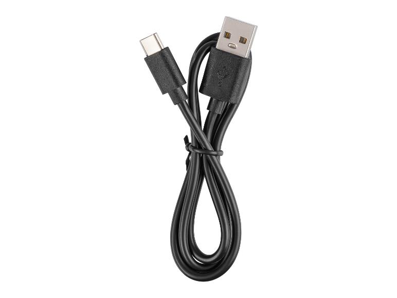 Câble noir USB-C vers USB-A, enroulé et sécurisé, sur fond blanc.
