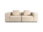 Canapé modulaire beige avec coussins