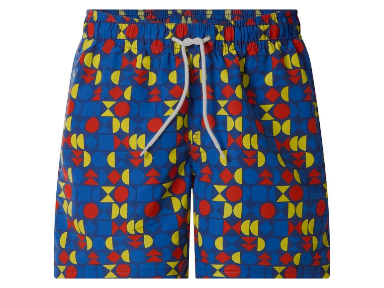 Short de bain bleu avec un motif géométrique coloré de formes rouges, jaunes et bleues.