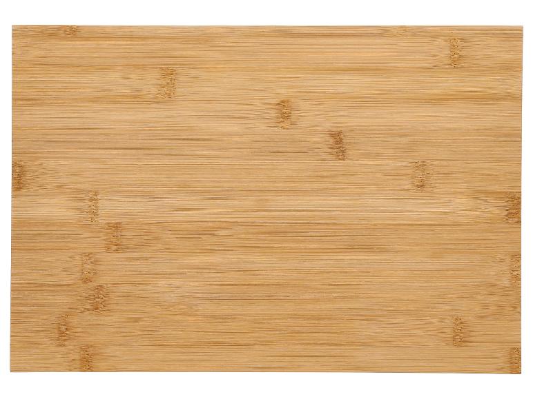 Texture de planche à découper en bambou clair avec des motifs de grain horizontaux.