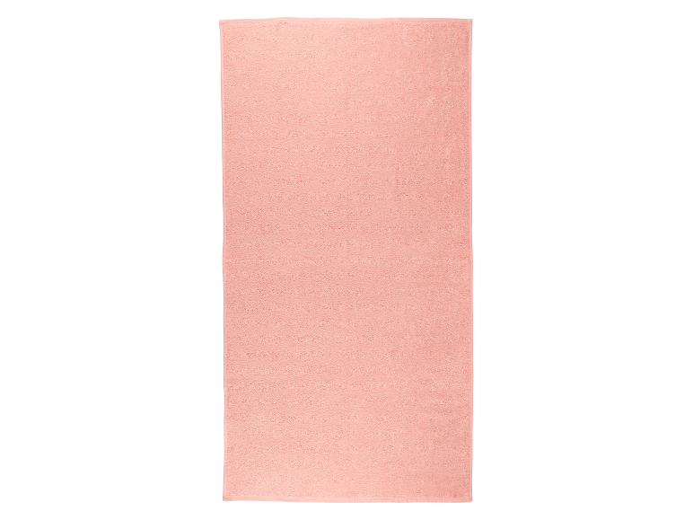 Serviette de bain rose clair.