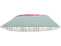Coussin de Noël avec un camion rouge transportant un sapin sous la neige, motif à carreaux en bas.