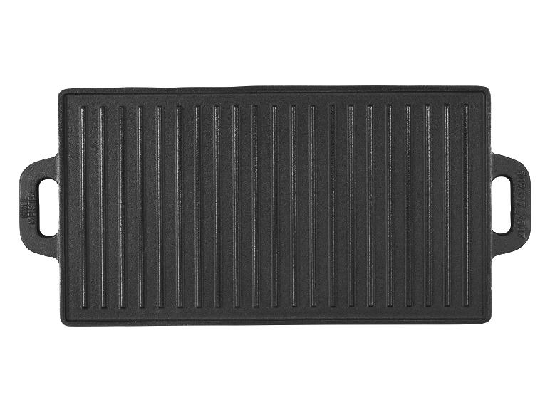 Plaque de gril en fonte noire avec poignées, surface striée et texte « GRILL MEISTER ».