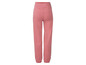 Pantalon de survêtement rose avec taille élastique.