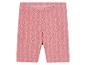 Shorts rose à motif feuilles stylisé.