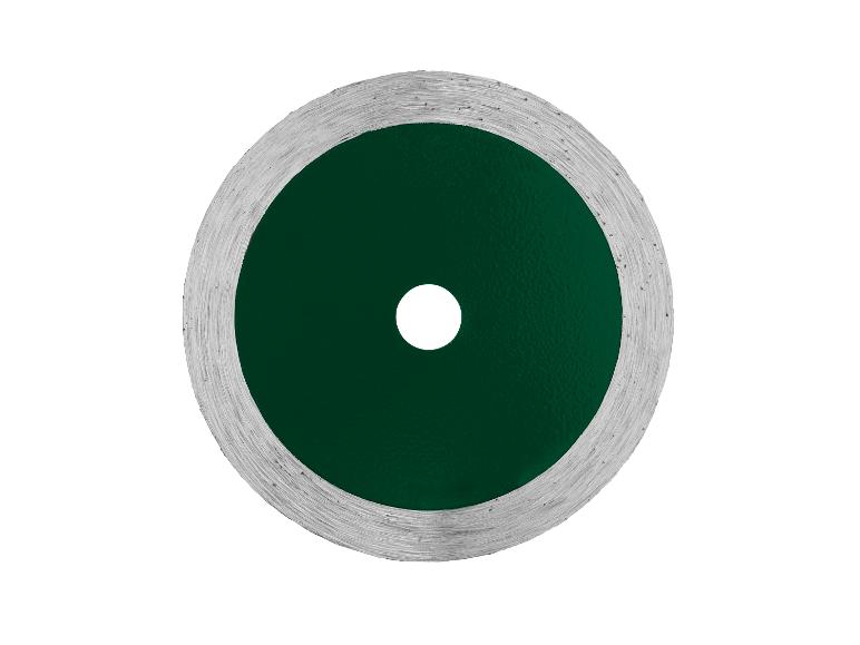 Disque de coupe vert et argenté avec un trou central, pour outils électriques.