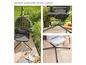 Deux chaises suspendues avec une structure métallique et un coussin.