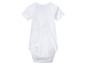 Un body blanc à manches courtes pour bébé.
