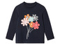 Un t-shirt bleu marine à manches longues avec un imprimé de fleurs et le mot 'Joyful'.