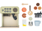 Machine à café jouet avec accessoires : tasses, carton de lait, grains de café et cuillère.