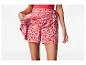 Shorts à fleurs rouges et roses, style portefeuille.