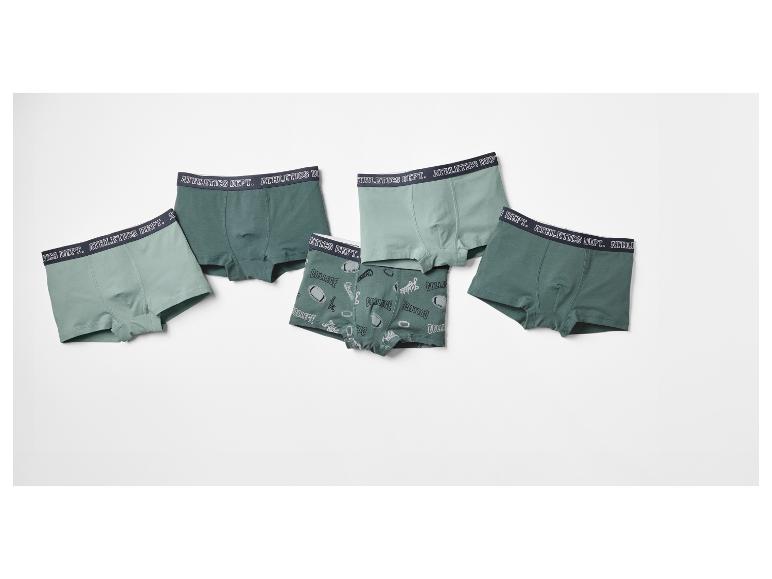 Cinq boxers verts, quatre avec l'inscription « ATHLETICS DEPT. » sur la ceinture et un à thème sportif.