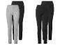 Deux paires de leggings : une grise et une noire, plus deux paires de leggings noirs.