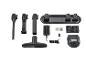 Accessoires pour un aspirateur Silvercrest, y compris un chargeur, un support mural et différentes buses.
