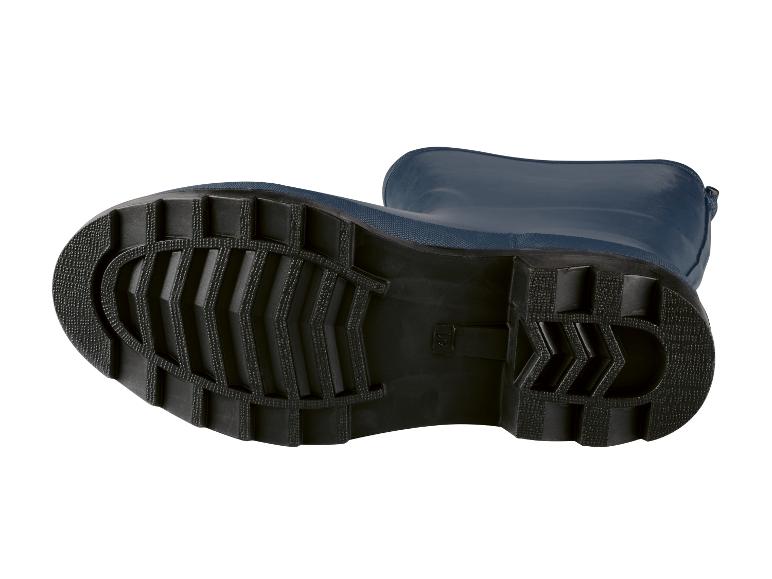 Les semelles de bottes en caoutchouc bleues.