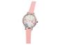 Une montre rose avec un cadran floral.