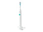 Une brosse à dents électrique Philips Sonicare avec un chargeur.