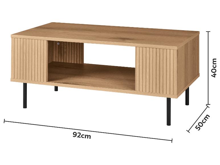 Table basse en bois avec détails nervurés et pieds noirs, mesurant 92x50x40 cm.