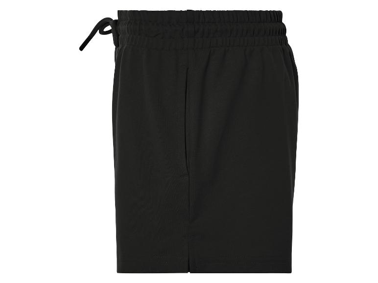 Shorts noirs à cordon de serrage.