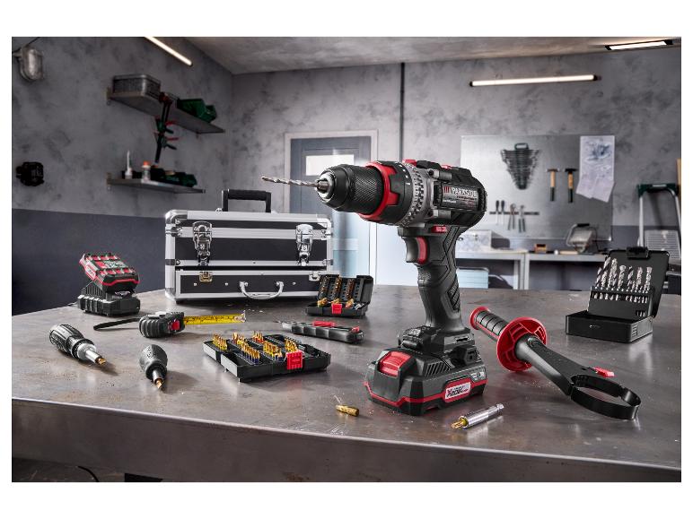 Perceuse à percussion sans fil PARKSIDE PERFORMANCE® 20 V avec accessoires sur établi