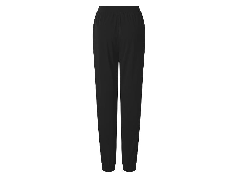 Jogging noir pour femme avec taille élastique et chevilles resserrées, vue arrière.