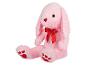 Un lapin en peluche rose avec un nœud rouge.
