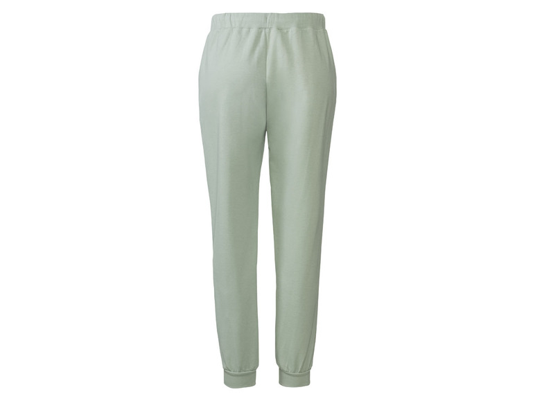 Pantalon de survêtement vert pour femme.