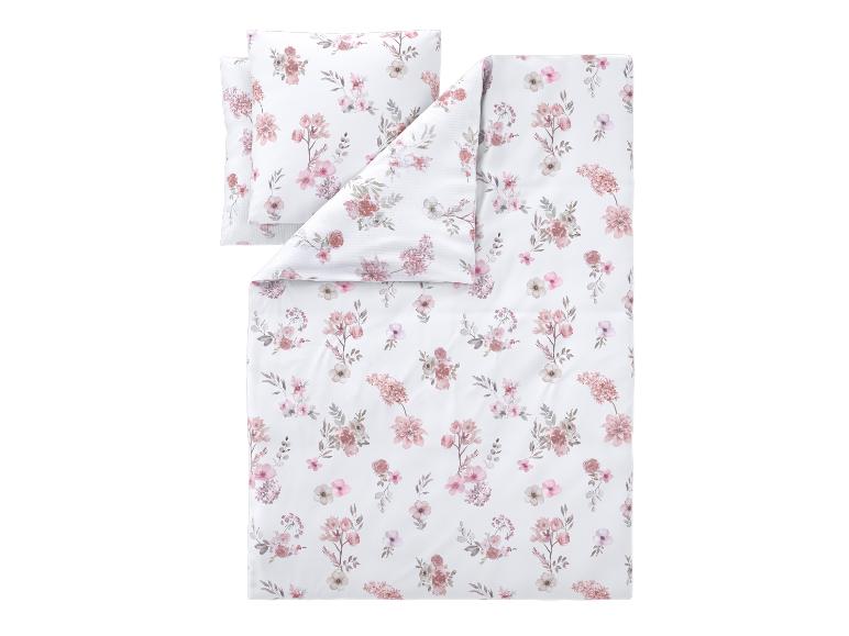 Parure de lit blanche avec un délicat motif floral rose et marron