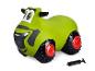 Un tracteur Claas gonflable vert pour enfants, avec une pompe.