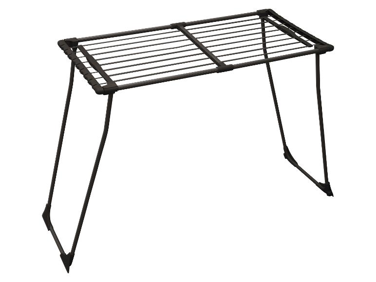 Séchoir à linge pliable noir avec barres métalliques.