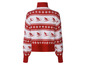 Un pull rouge et blanc avec un motif de ski.