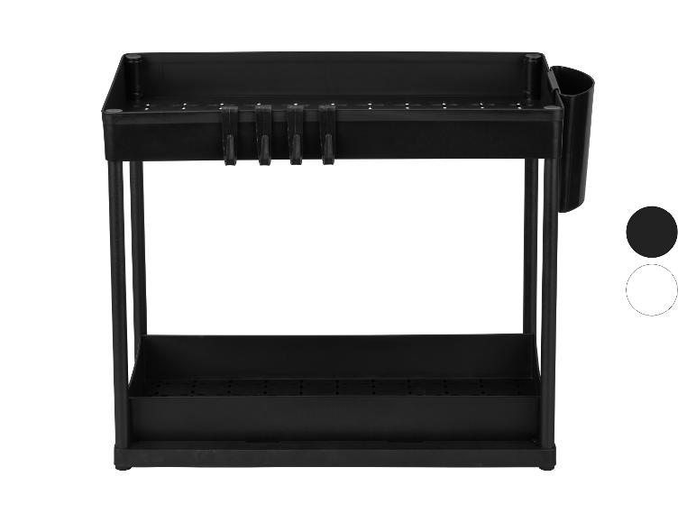 Étagère de rangement noire à deux niveaux avec crochets et porte-ustensiles.
