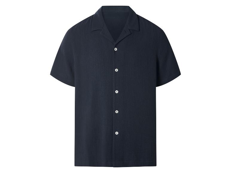 Chemise bleu marine à manches courtes avec boutons blancs
