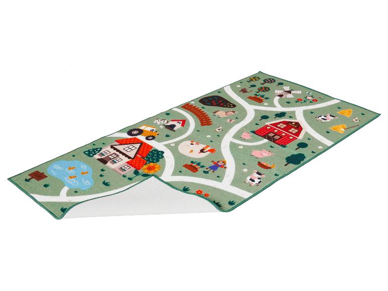 Tapis de jeu pour enfants sur le thème de la ferme, avec routes et animaux.