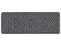 Tapis rectangulaire avec un motif géométrique de losanges dans des tons de gris.
