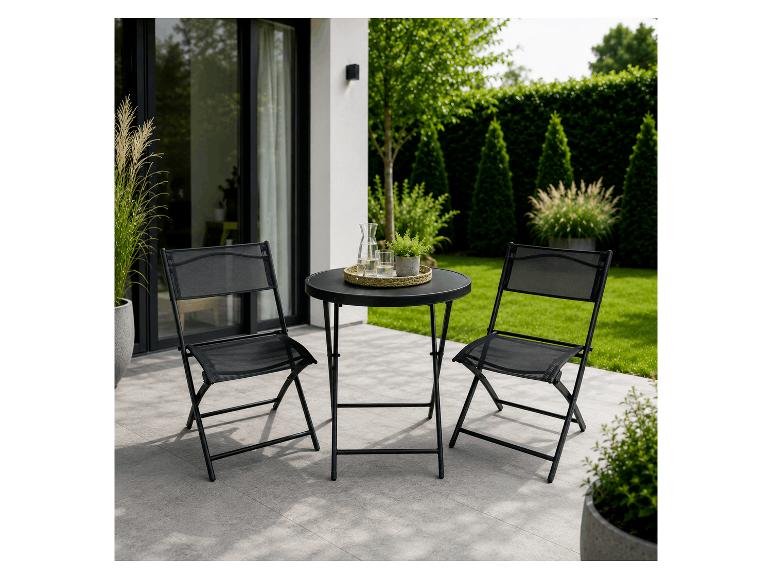 Ensemble bistrot noir avec deux chaises pliantes et une table ronde sur une terrasse.