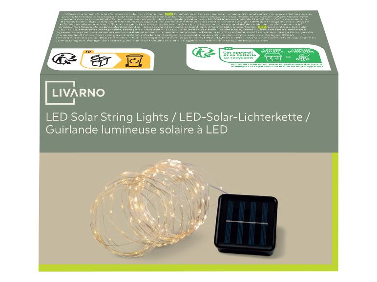 Emballage de guirlande lumineuse solaire à LED avec informations de recyclage et panneau solaire visible.