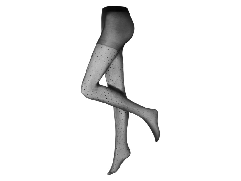 Collants noirs à pois blancs.