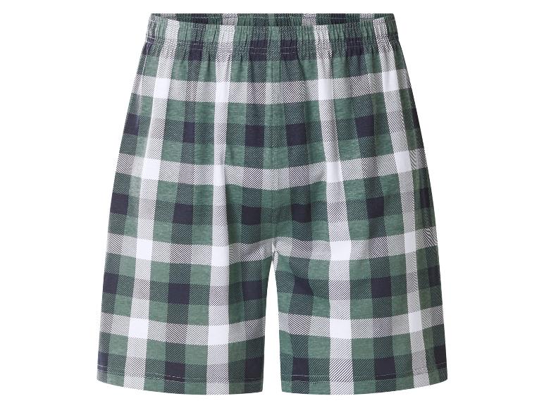 Shorts à carreaux verts, blancs et bleu foncé avec taille élastique.