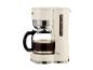 Cafetière électrique crème avec carafe en verre.
