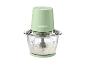 Hachoir électrique vert clair avec bol en verre et contenu blanc.