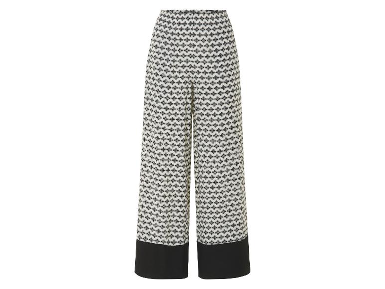 Pantalons larges à motif géométrique noir et blanc.
