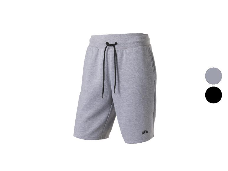 Shorts de sport gris avec cordon de serrage noir et logo sur la jambe, également disponible en noir.