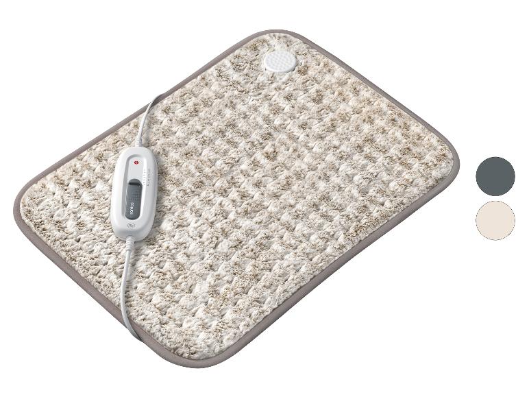 Couverture électrique moelleuse avec télécommande et réglages de chaleur.