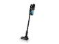 Un aspirateur sans fil noir avec une tête de brosse rotative.